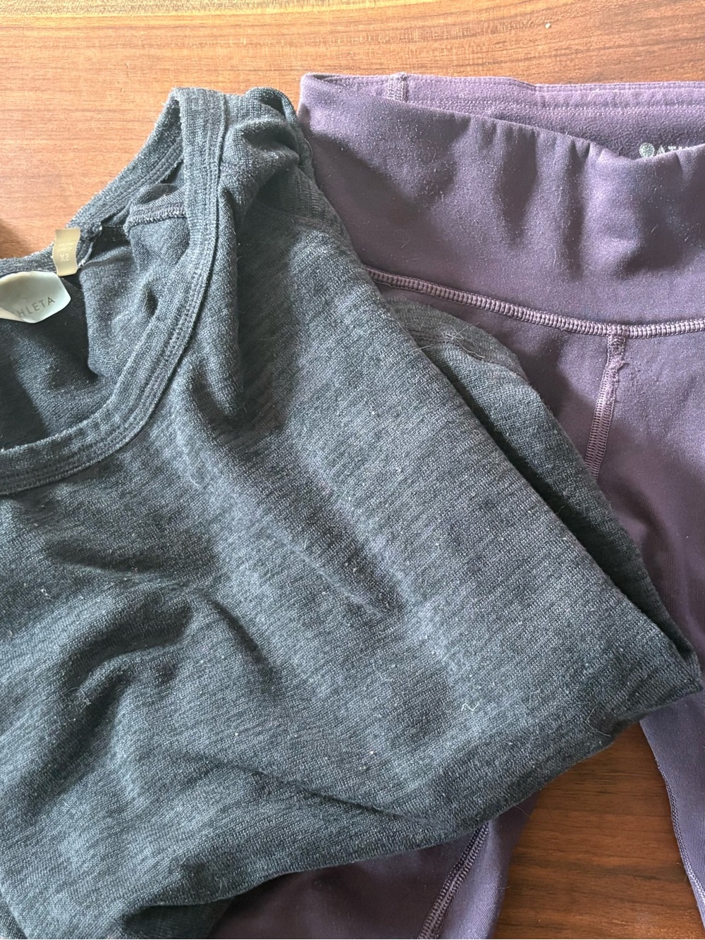 Athleta Long Sleeve fleece-lined grey hiking shirt and purple insulated leggings